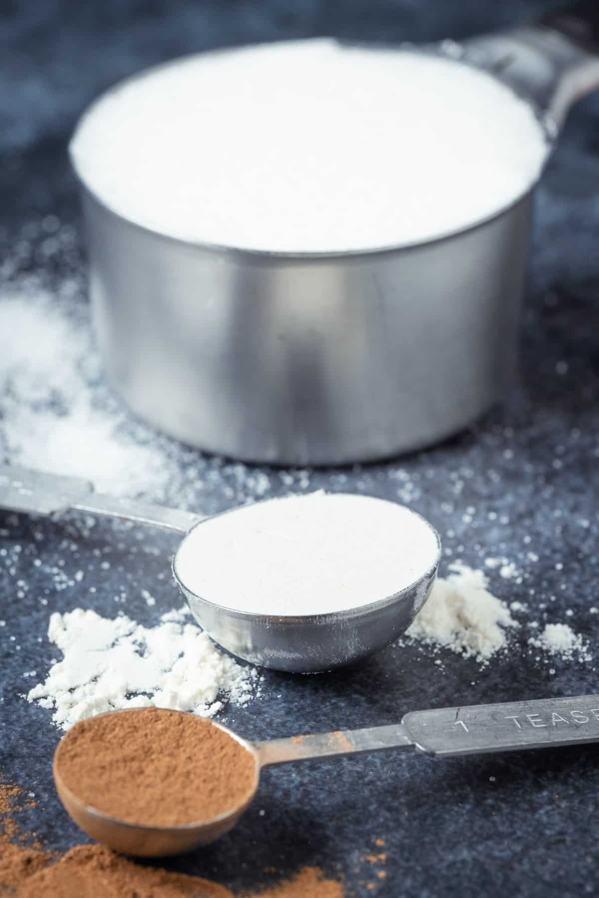 Flour, cinnamon, sugar etc in cups, tablespoons and teaspoons.