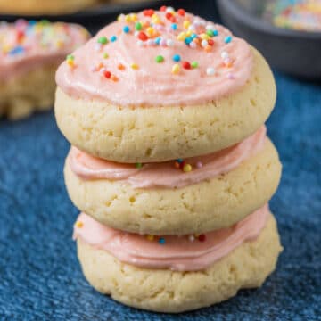 Stack of vegan frosted sugar cookies.