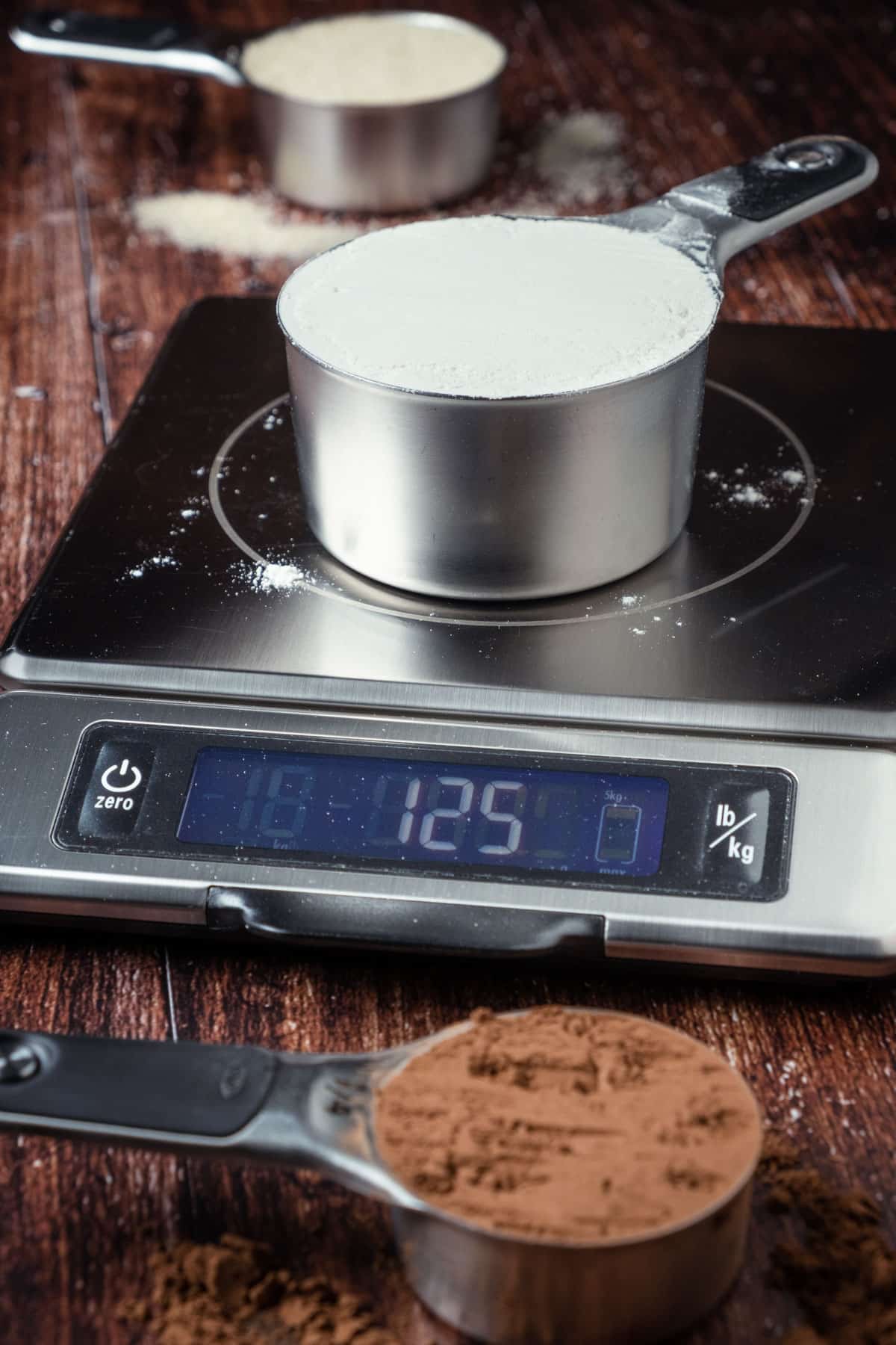 Cup of flour on a food scale. 