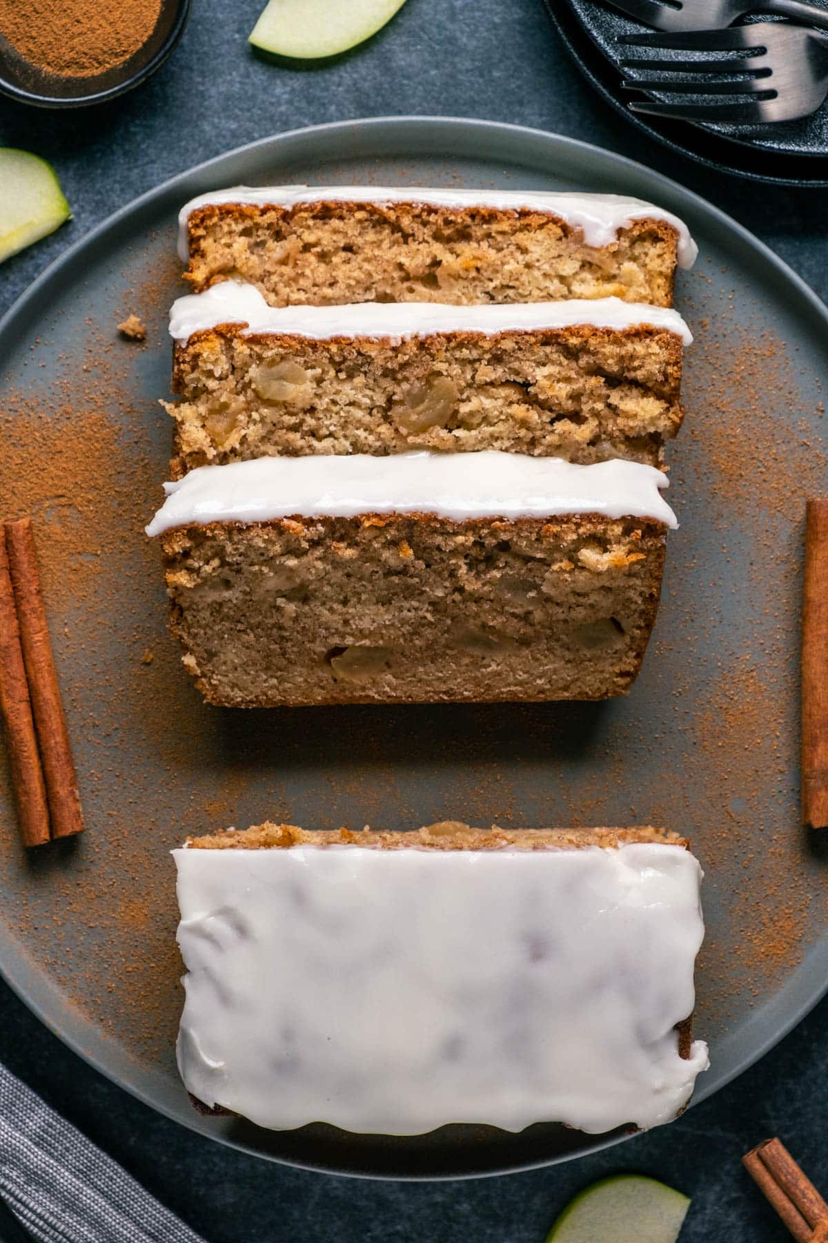 Vegan Apple Bread cut and served on a gray plate.