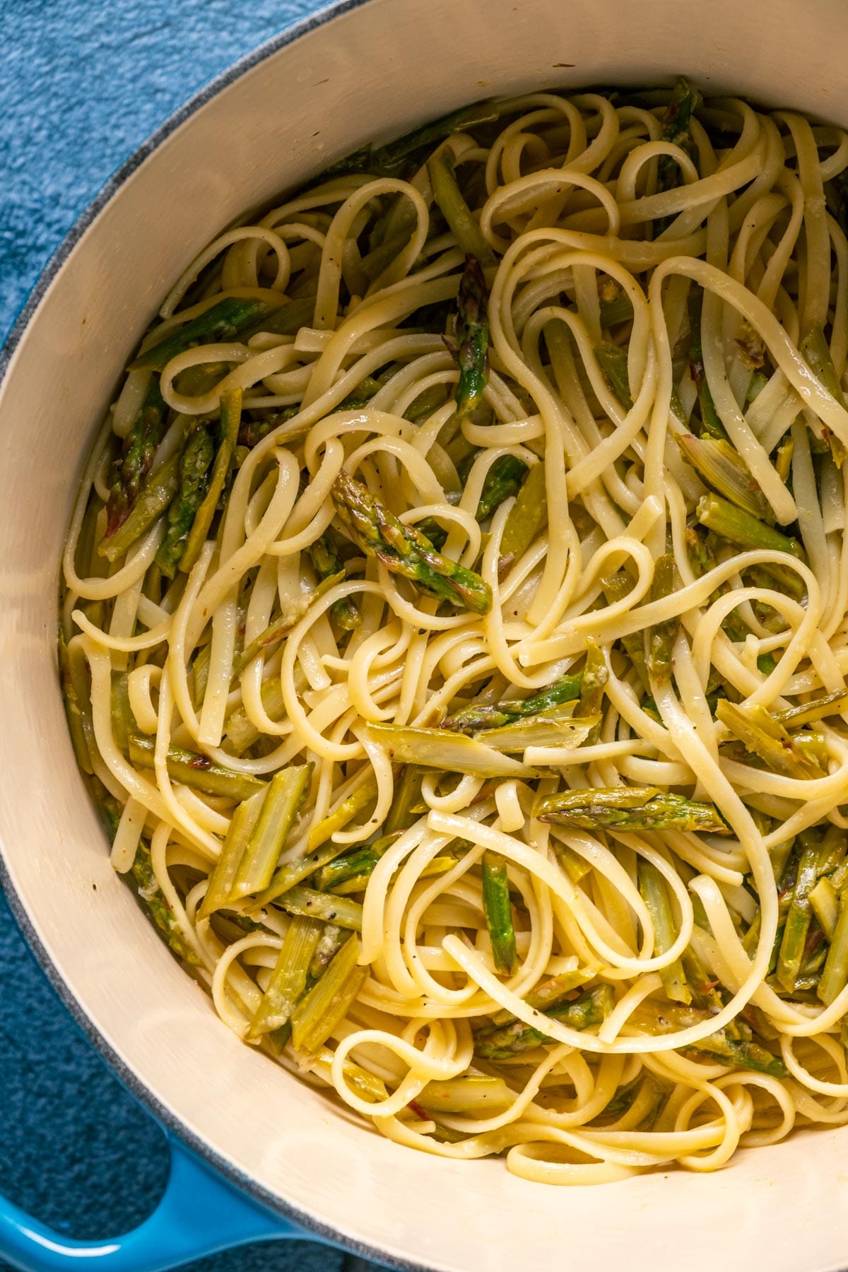Vegan asparagus pasta in a pot.