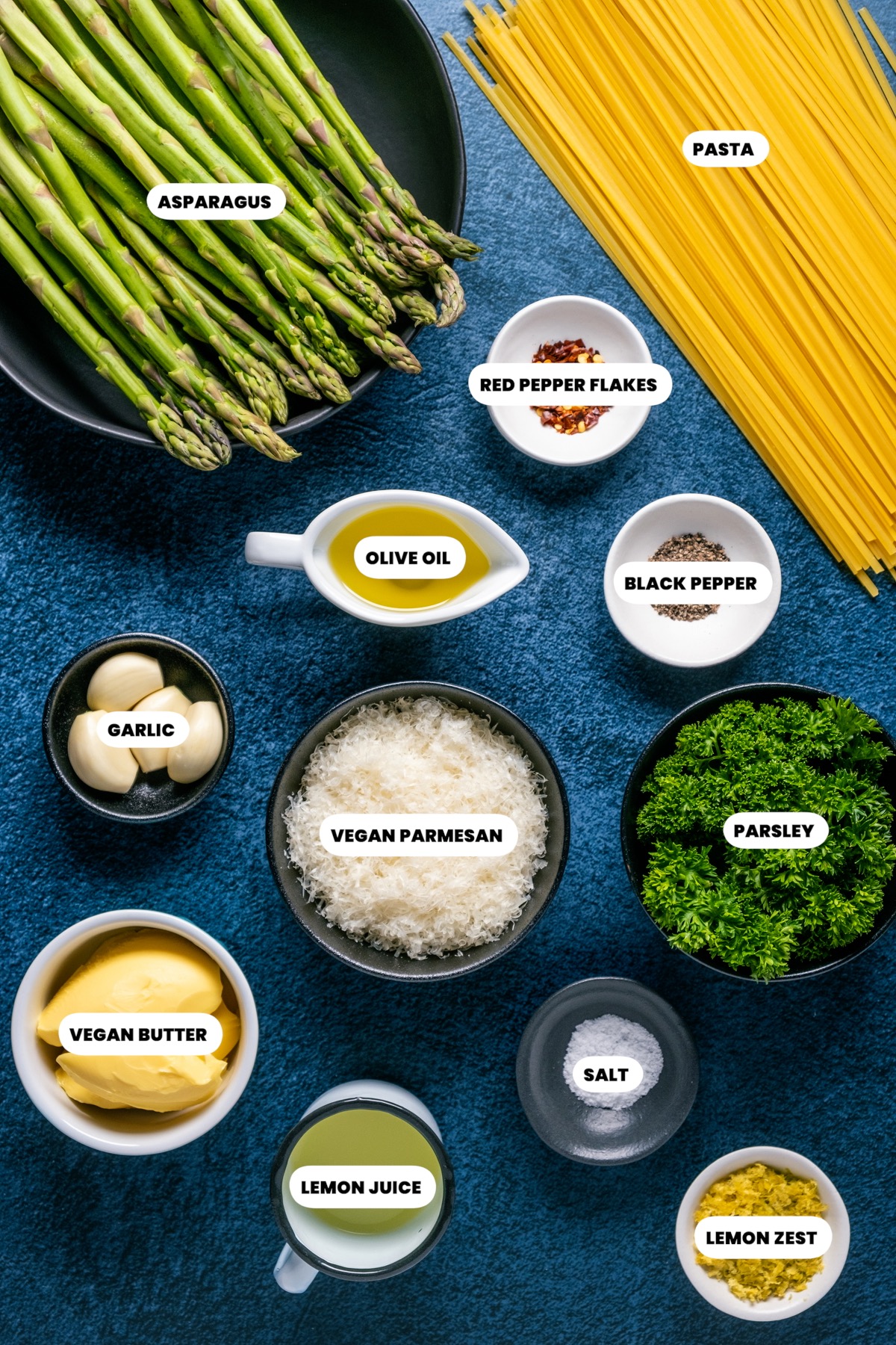 Photo of the ingredients needed to make vegan asparagus pasta.