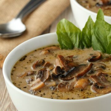 Vegan mushroom soup in a white bowl.