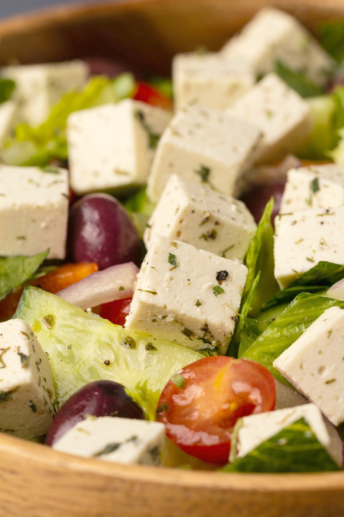 Vegan feta on top of a Greek salad. 