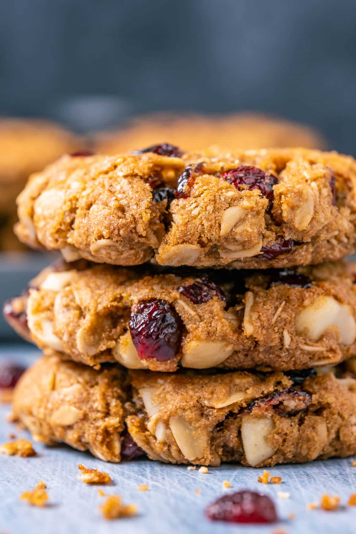 Stack of three oatmeal cranberry cookies.