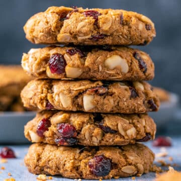 Vegan oatmeal cranberry cookies in a stack.