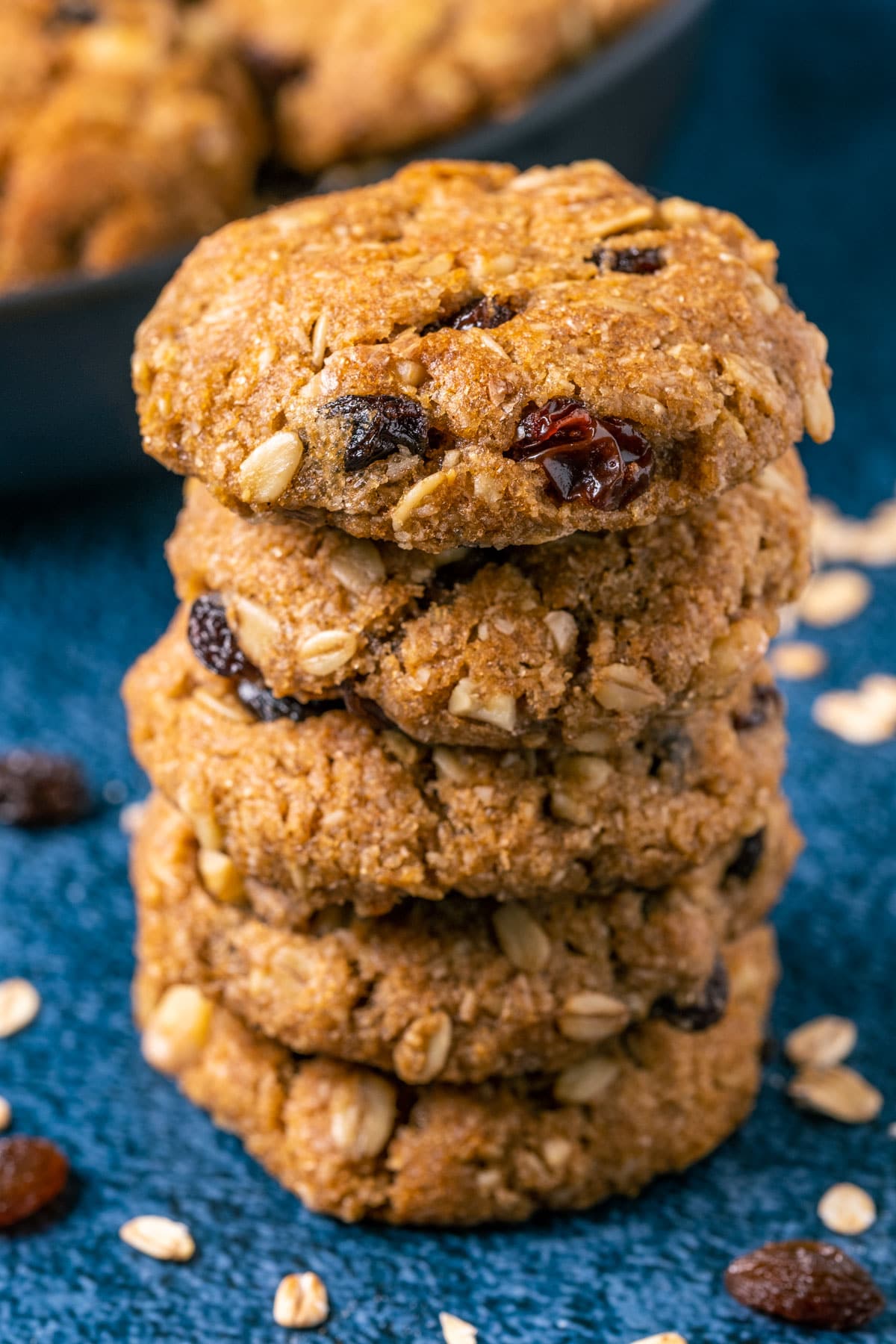 Vegan oatmeal raisin cookies in a stack.