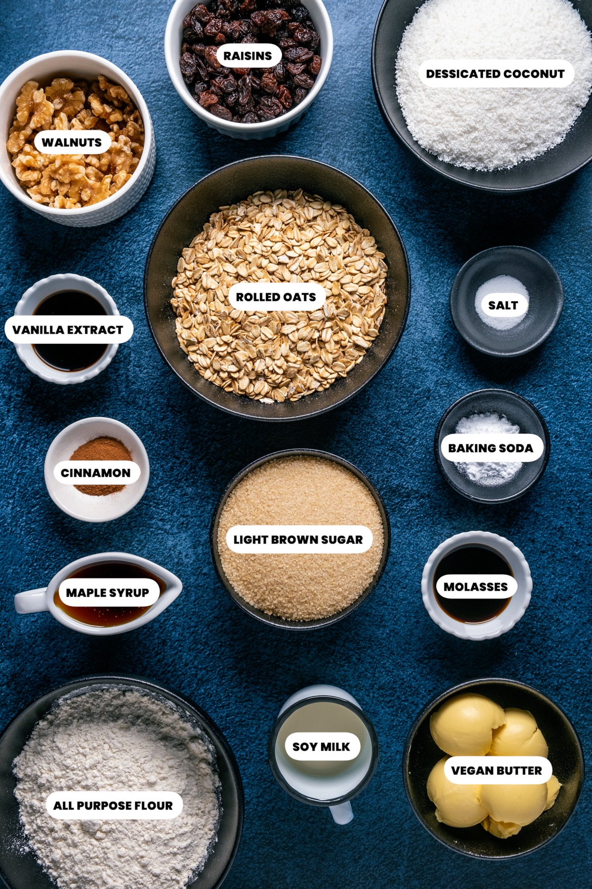 Photo of the ingredients needed to make vegan oatmeal raisin cookies.